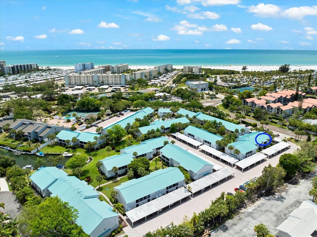 5641 Midnight Pass Road, Unit 902 Sarasota, FL 34242 - Photo 76 of 81 an aerial view of a city