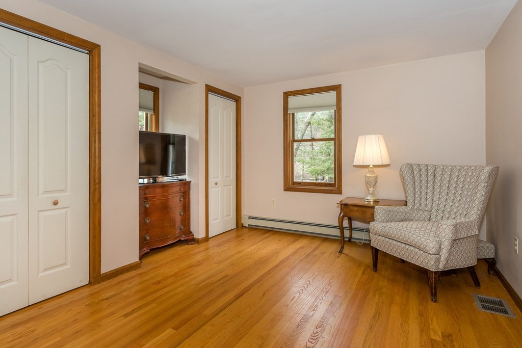 49 Angela Street Canton, MA 02021 - Photo 11 of 25 a living room with furniture and a window