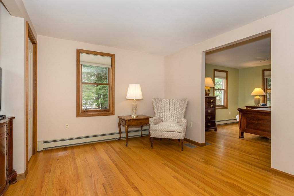 49 Angela Street Canton, MA 02021 - Photo 12 of 25 a living room with furniture and a wooden floor
