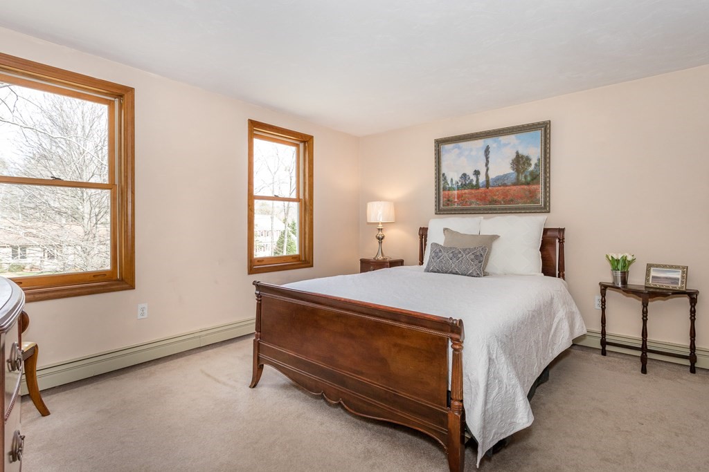 49 Angela Street Canton, MA 02021 - Photo 16 of 25 a bedroom with a bed and a window