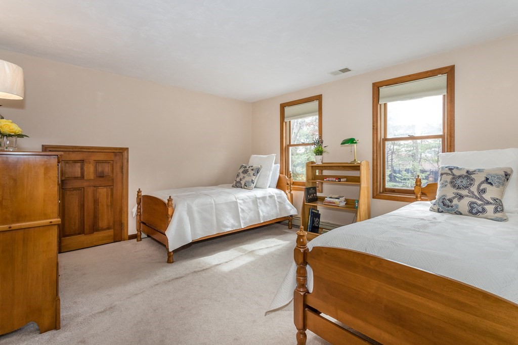 49 Angela Street Canton, MA 02021 - Photo 17 of 25 a bedroom with two beds and a window