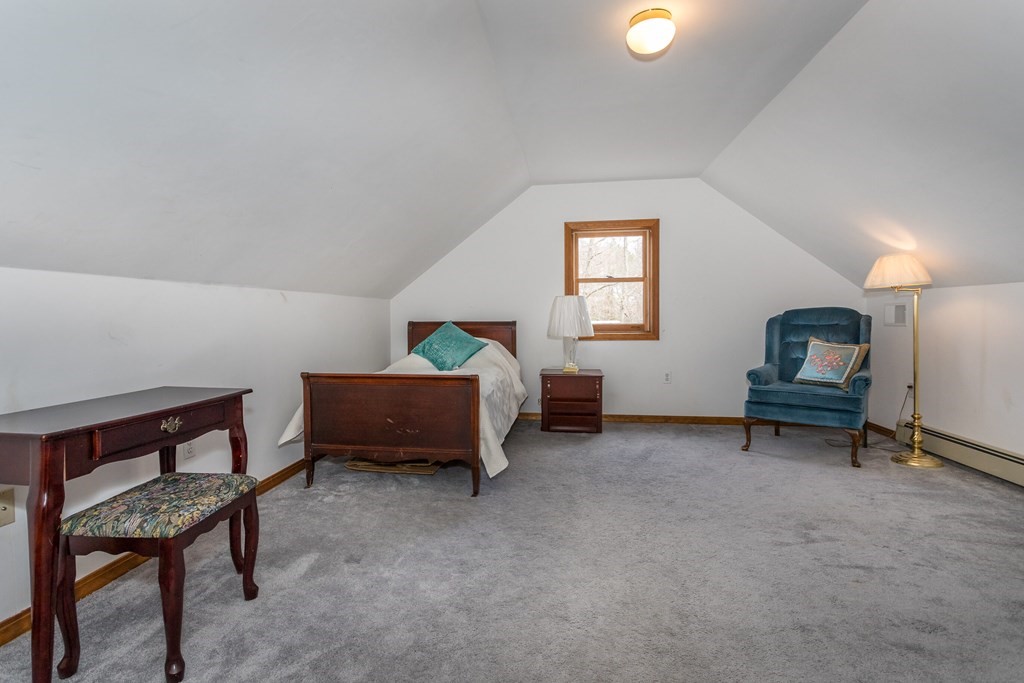 49 Angela Street Canton, MA 02021 - Photo 20 of 25 a bedroom with furniture and a window
