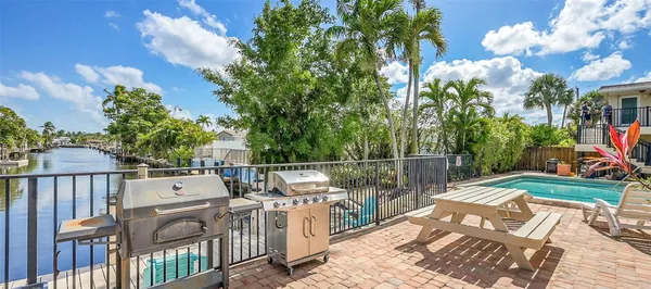 a view of a deck with a yard