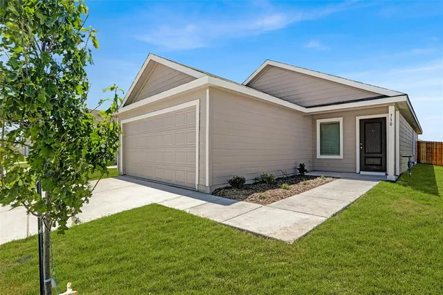a backyard of a house with seating space