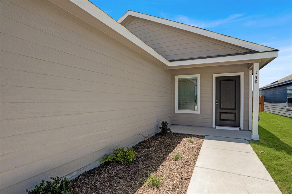 1033 Raintree Road Princeton, TX 75407 - Photo 2 of 25 a house with a outdoor space