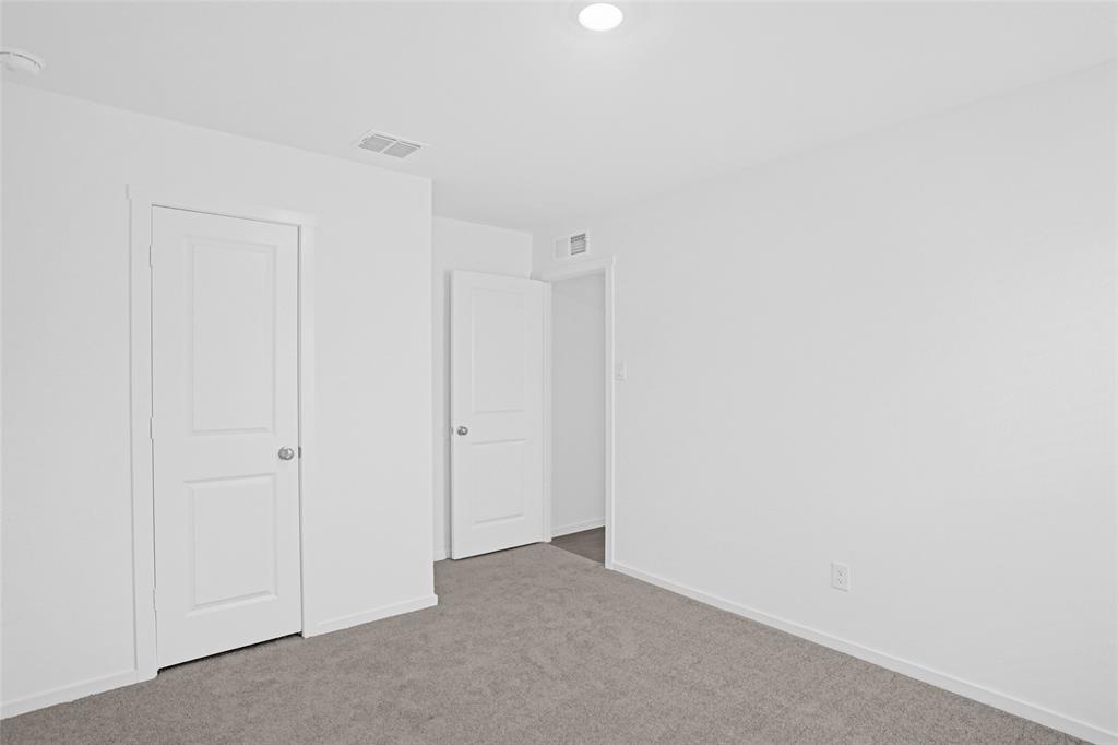 1033 Raintree Road Princeton, TX 75407 - Photo 23 of 26 a view of an empty room