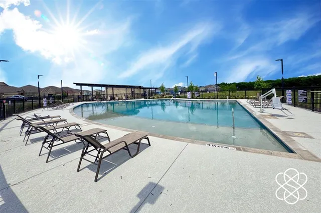 a view of a park with large trees