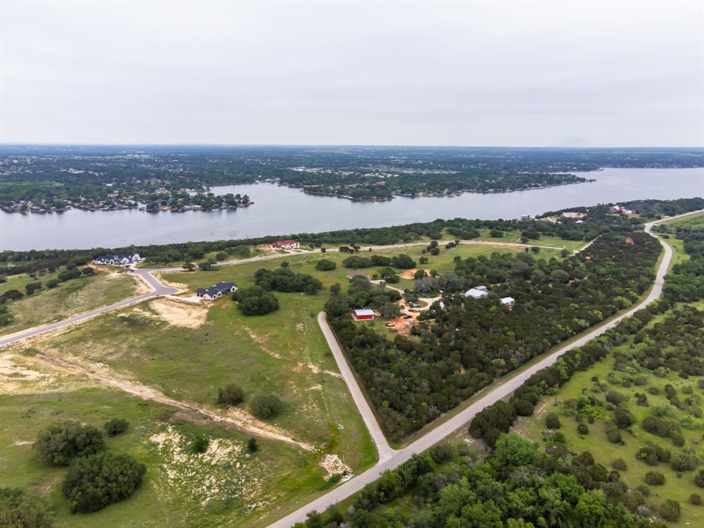 3556 Williamson Road Granbury, TX 76048 - Photo 5 of 9 an aerial view of residential houses with outdoor space