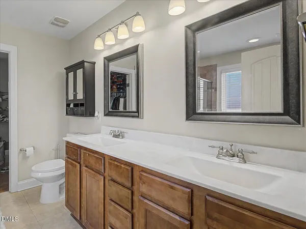 a bathroom with a tub and a window