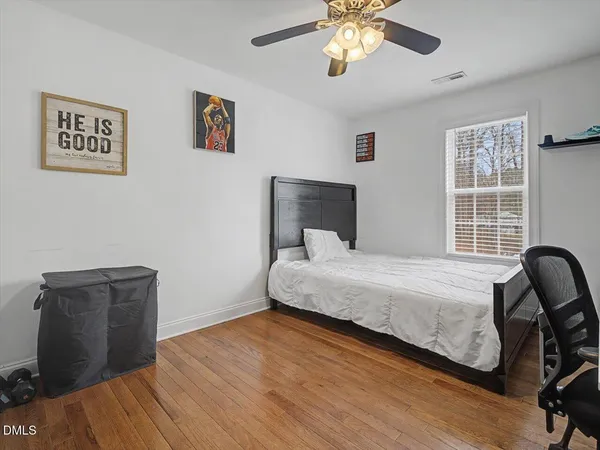 a view of a livingroom with furniture and a flat screen tv