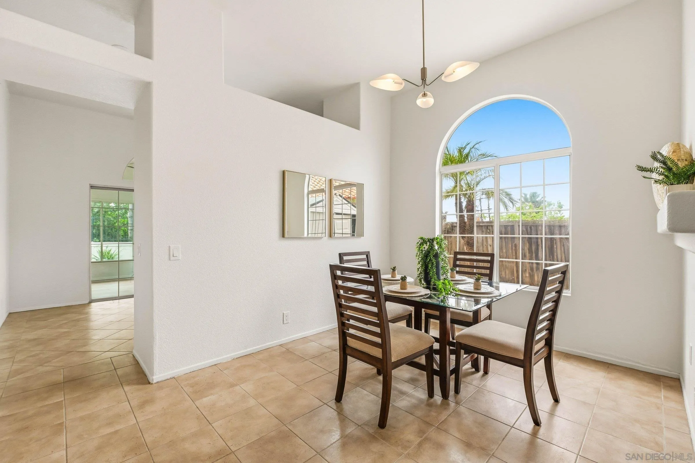 4290 Via Clemente Oceanside, CA 92057 - Photo 11 of 34 a view of a dining room with furniture window and wooden floor