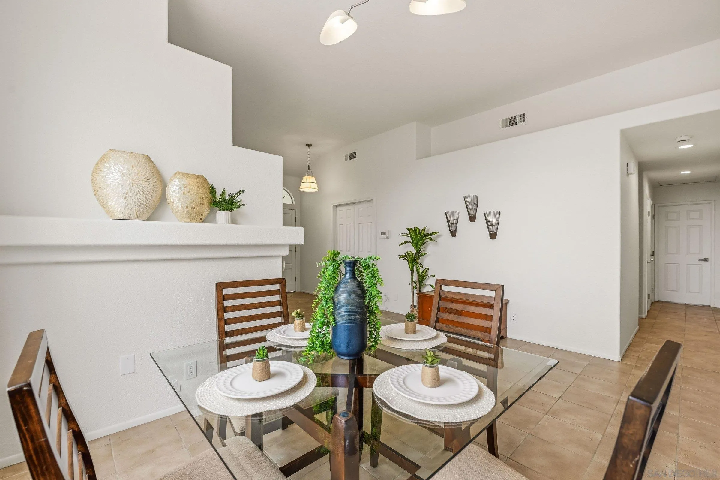 4290 Via Clemente Oceanside, CA 92057 - Photo 12 of 34 a living room with furniture and a potted plant