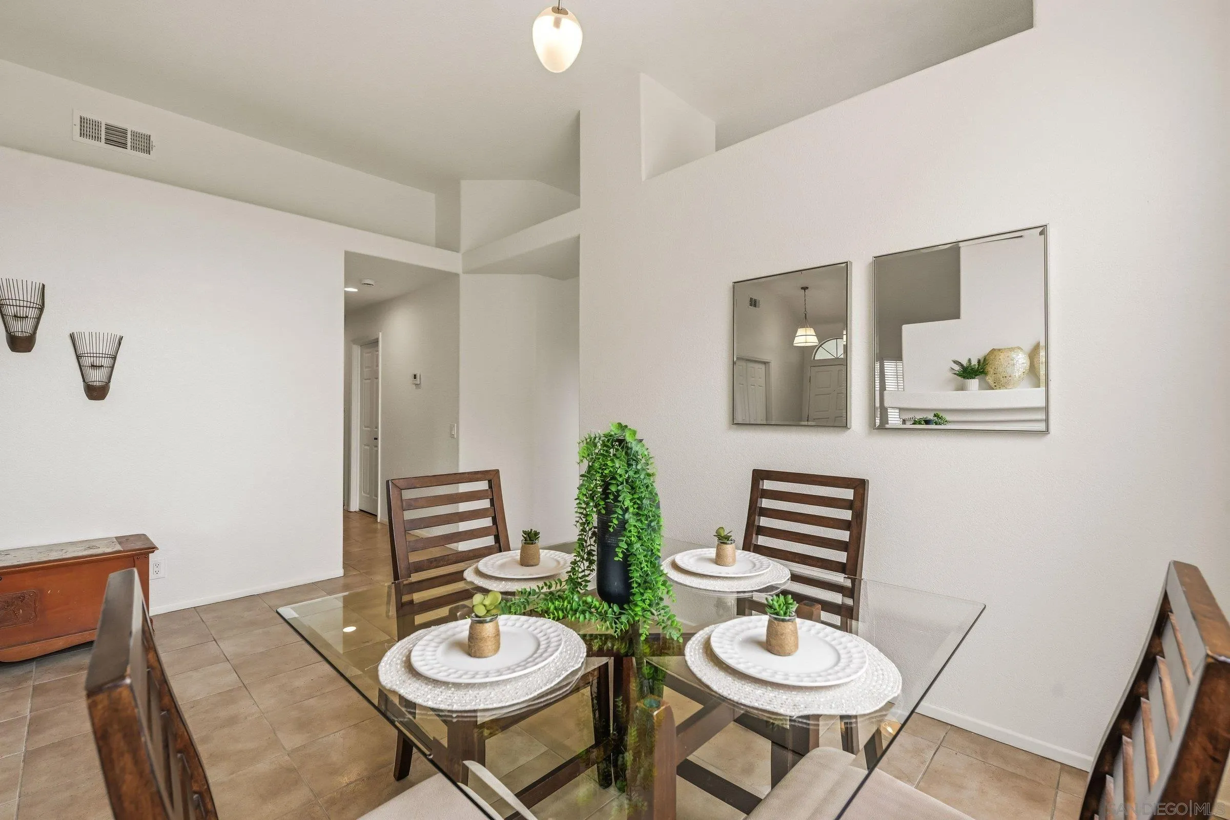 4290 Via Clemente Oceanside, CA 92057 - Photo 13 of 34 a view of a dining room with furniture and wooden floor