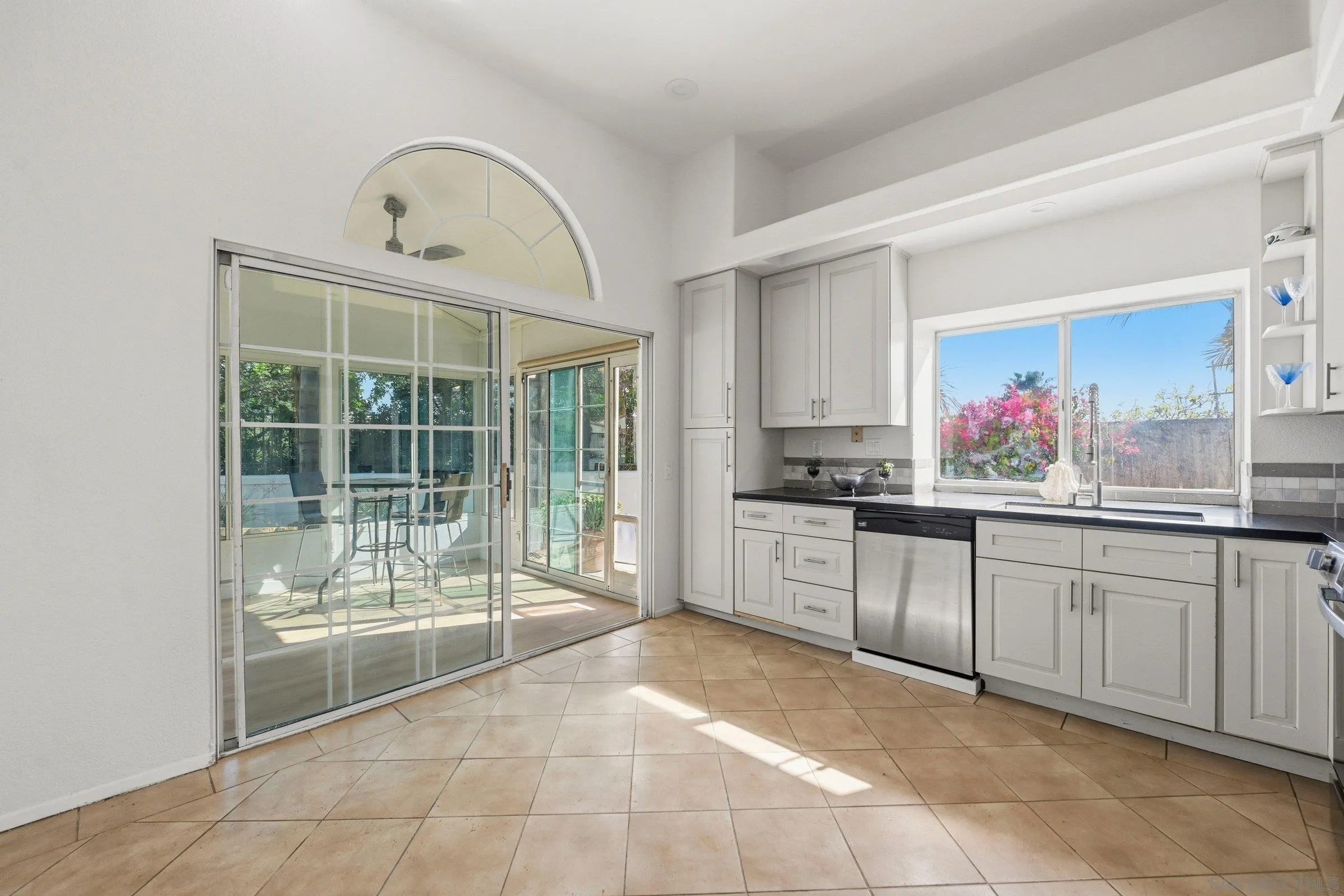 4290 Via Clemente Oceanside, CA 92057 - Photo 15 of 34 a large kitchen with kitchen island a large counter space and stainless steel appliances