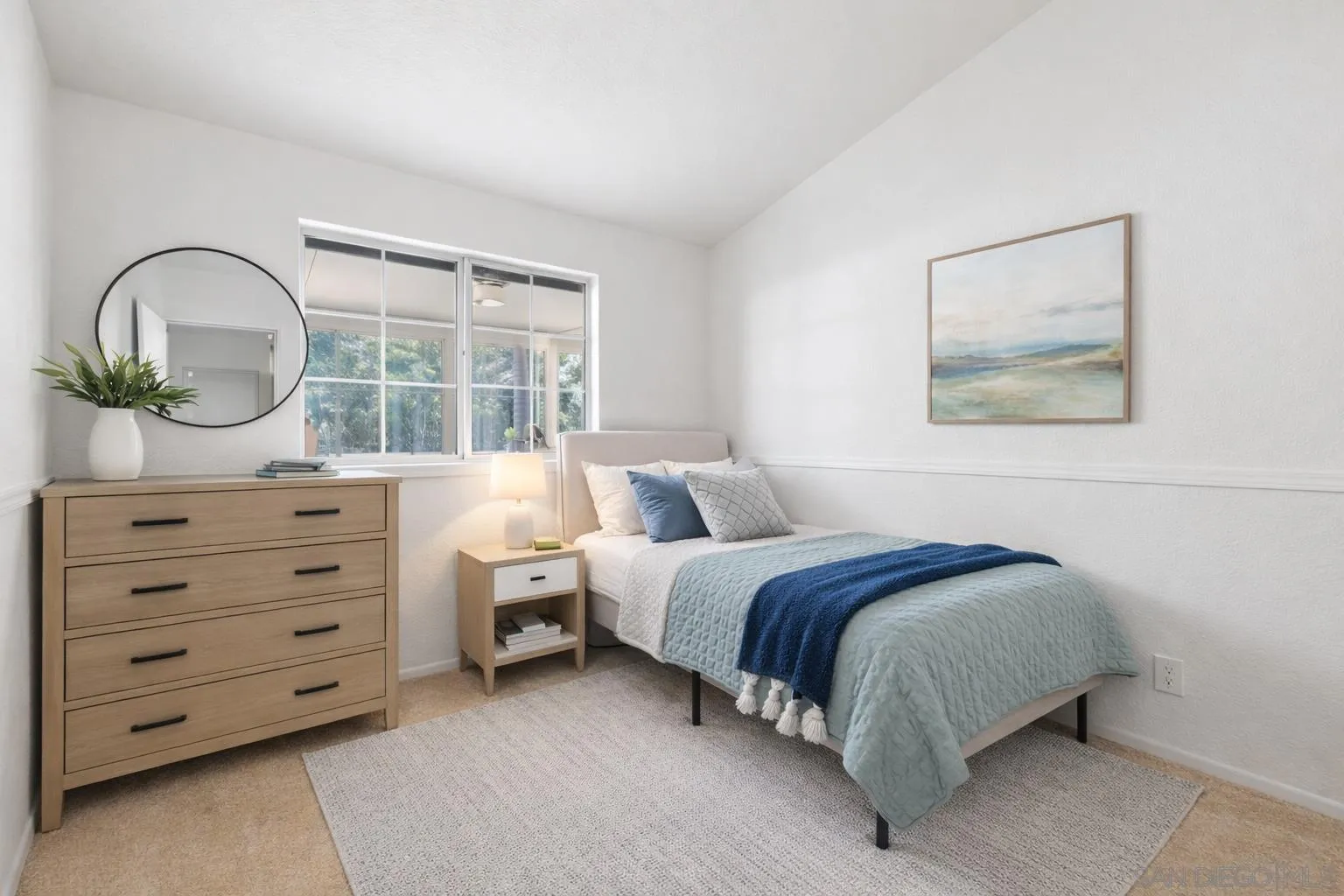 4290 Via Clemente Oceanside, CA 92057 - Photo 20 of 34 a spacious bedroom with a bed and a large window