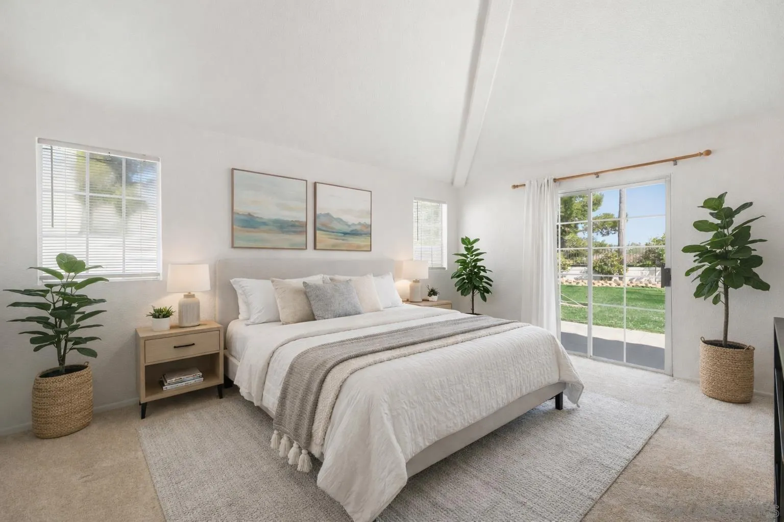 4290 Via Clemente Oceanside, CA 92057 - Photo 22 of 34 a bedroom with a bed and a potted plant