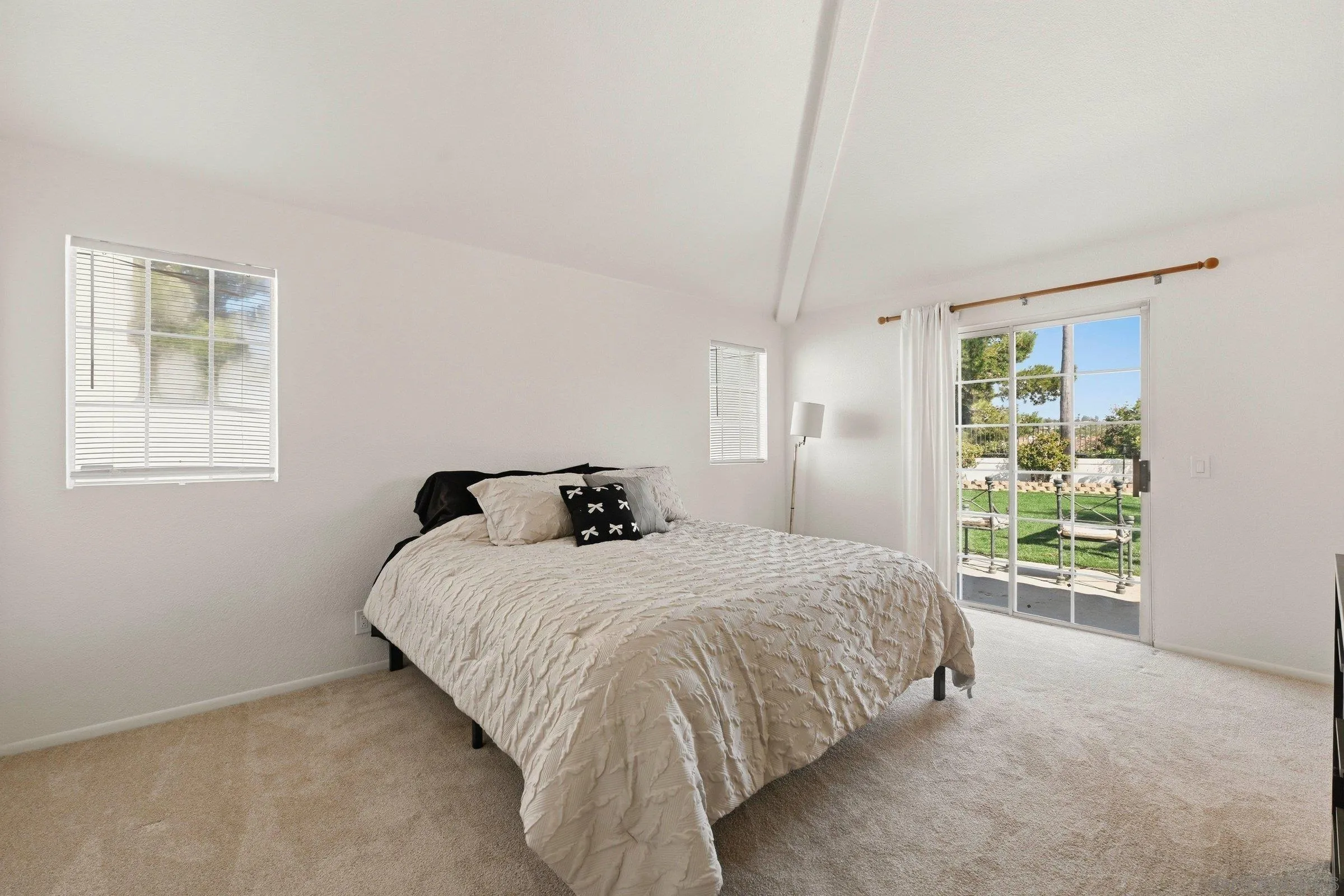 4290 Via Clemente Oceanside, CA 92057 - Photo 23 of 34 a bedroom with a bed and a window