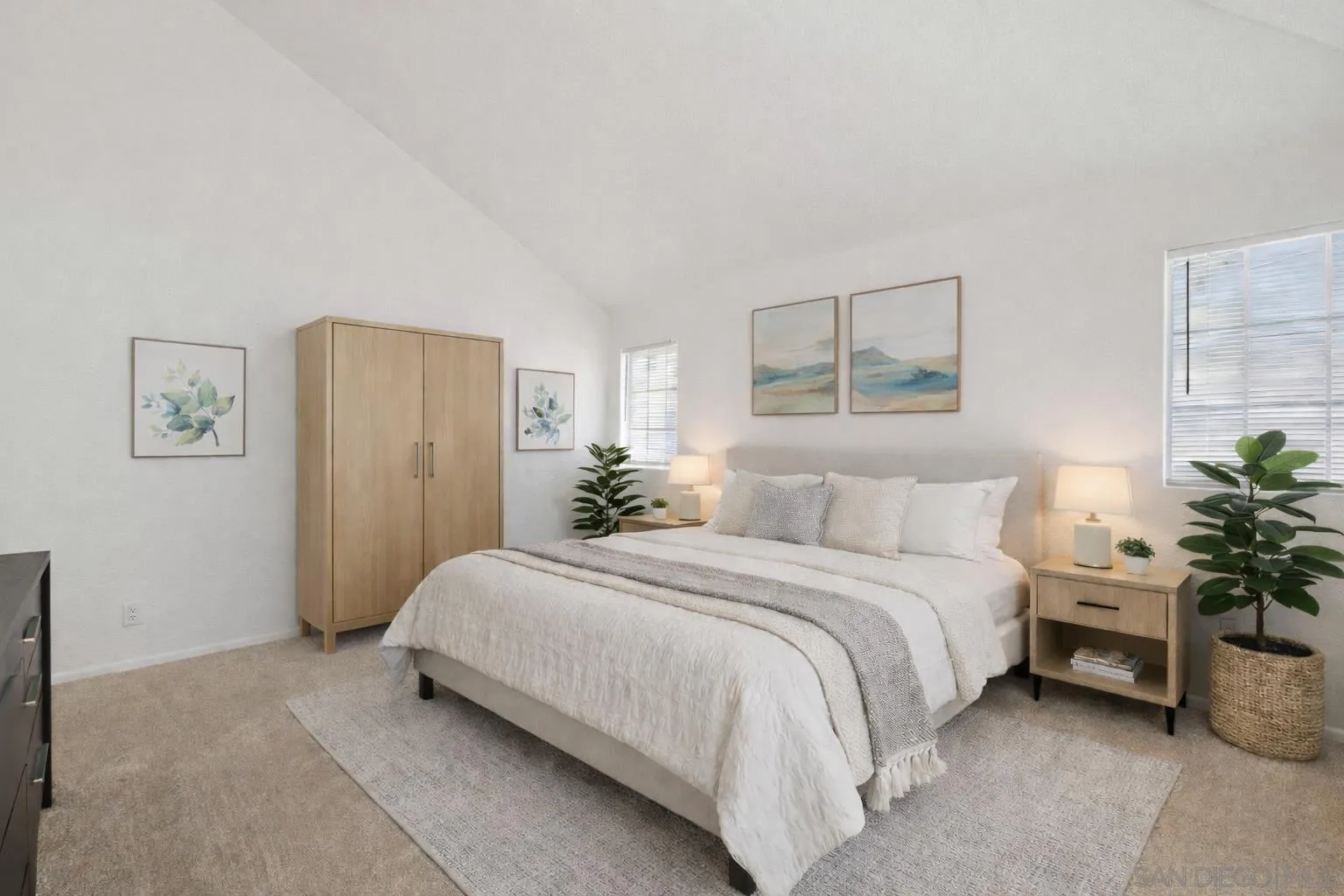 4290 Via Clemente Oceanside, CA 92057 - Photo 24 of 34 a bedroom with a bed and a potted plant