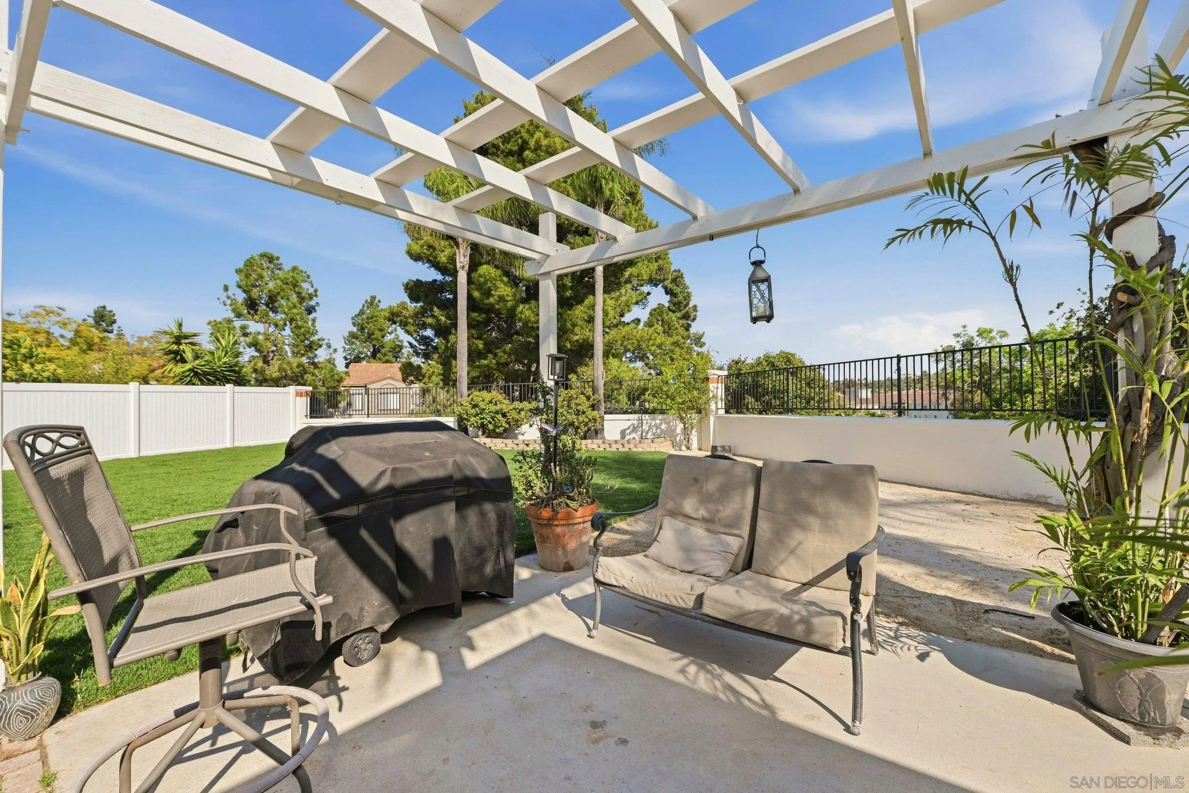4290 Via Clemente Oceanside, CA 92057 - Photo 34 of 34 a view of a patio with couches and potted plants