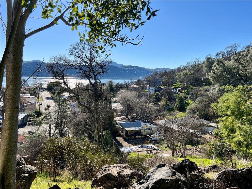 13517 Arrowhead Road Clearlake, CA 95422 - Photo 20 of 37 a view of a city with lush green forest