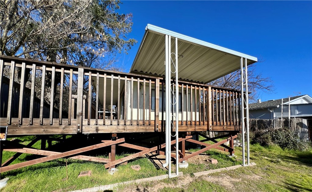 13517 Arrowhead Road Clearlake, CA 95422 - Photo 24 of 37 a view of wooden deck in backyard