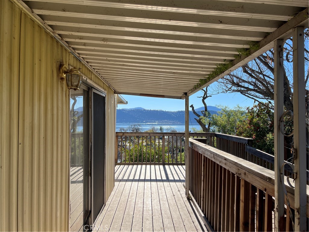 13517 Arrowhead Road Clearlake, CA 95422 - Photo 31 of 37 a view of a balcony with wooden floor