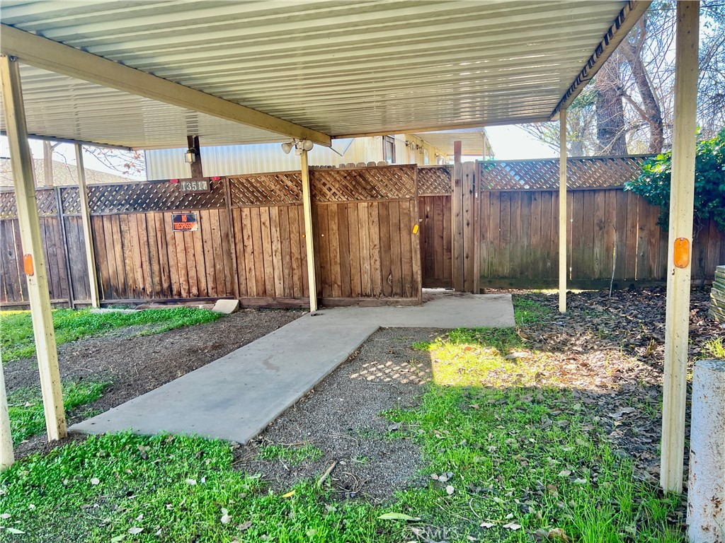 13517 Arrowhead Road Clearlake, CA 95422 - Photo 37 of 37 a backyard of a house with lots of green space