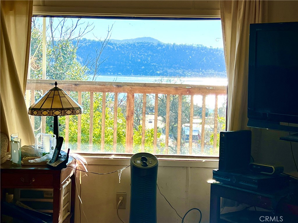 13517 Arrowhead Road Clearlake, CA 95422 - Photo 7 of 37 a view of a room with furniture and a window