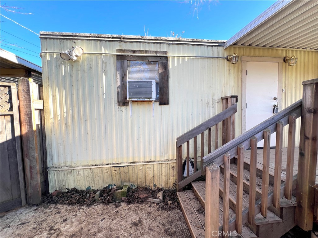 13517 Arrowhead Road Clearlake, CA 95422 - Photo 10 of 37 a view of a house with wooden deck