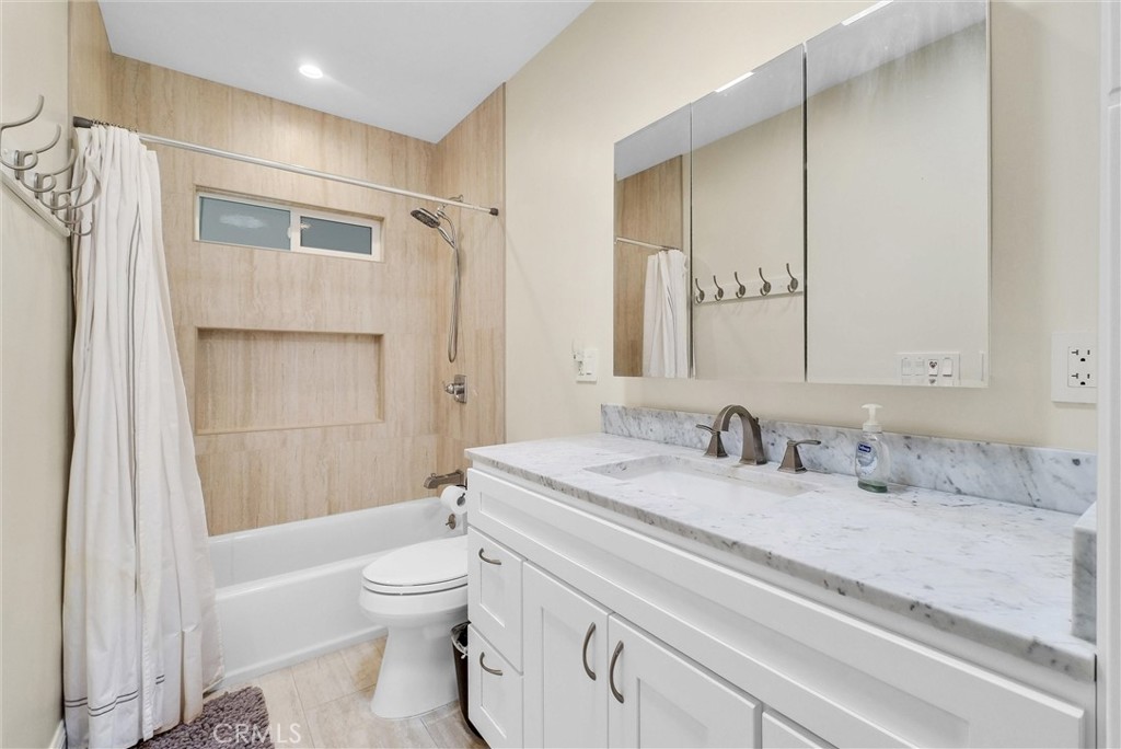 918 Dorothea Road La Habra Heights, CA 90631 - Photo 25 of 42 a bathroom with a granite countertop sink toilet and shower
