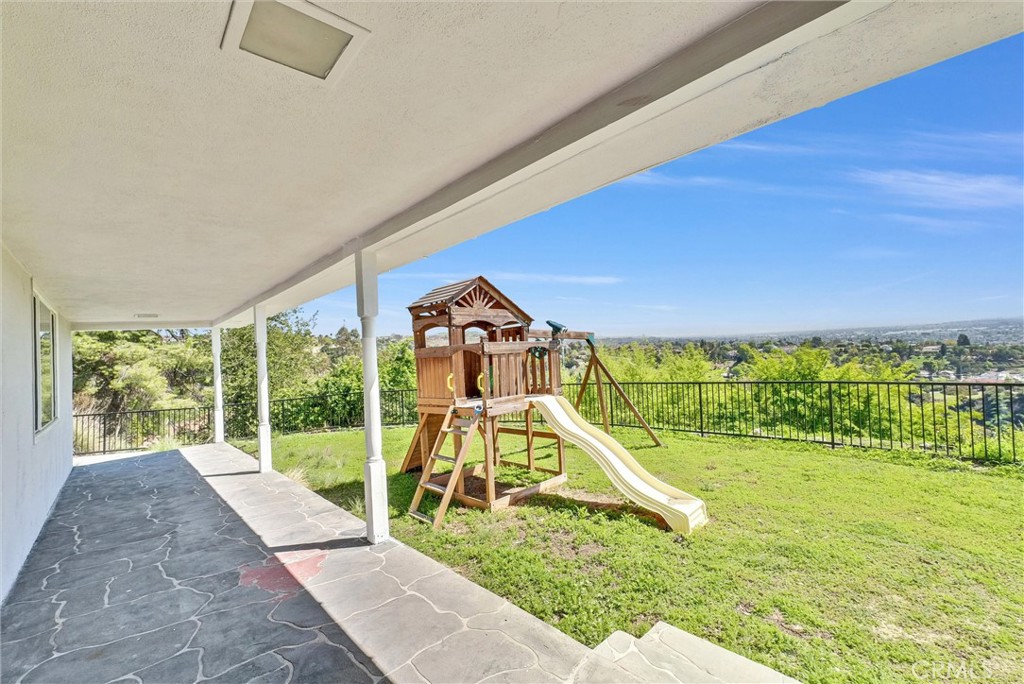 918 Dorothea Road La Habra Heights, CA 90631 - Photo 32 of 42 a view of a swimming pool with an outdoor seating