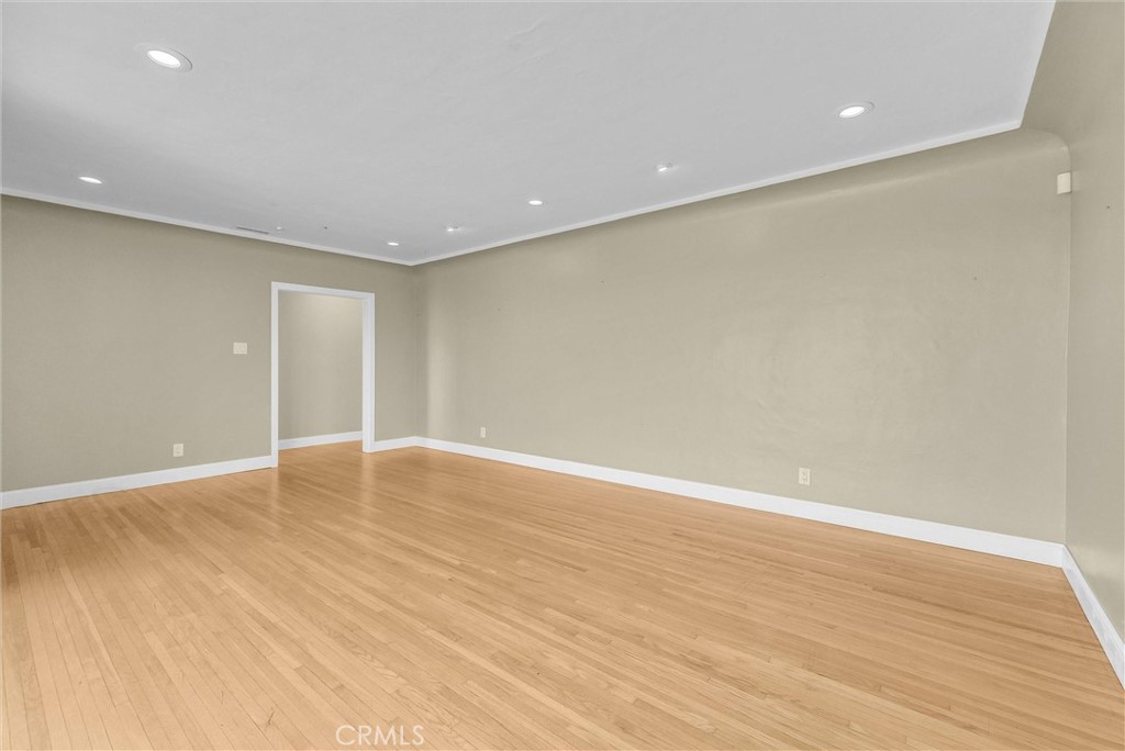 918 Dorothea Road La Habra Heights, CA 90631 - Photo 8 of 42 a view of an empty room with wooden floor