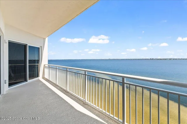 a view of balcony with furniture