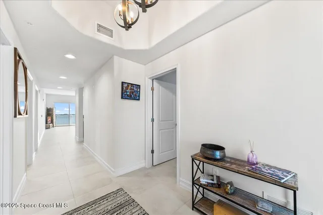a kitchen with a sink stainless steel appliances and cabinets