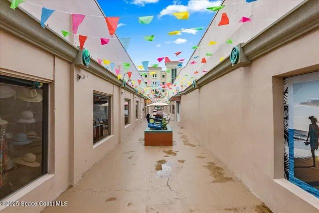 a view of a street with sitting area