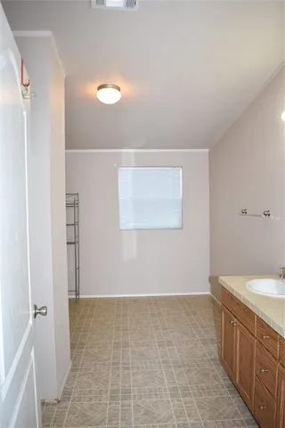 a bathroom with 2 sink and a mirror