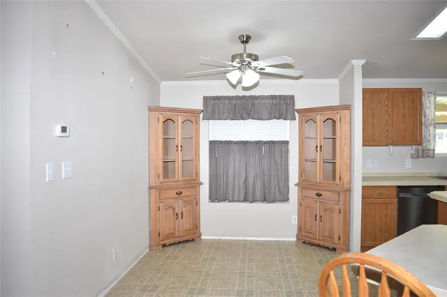 a view of a kitchen cabinets and wooden floor