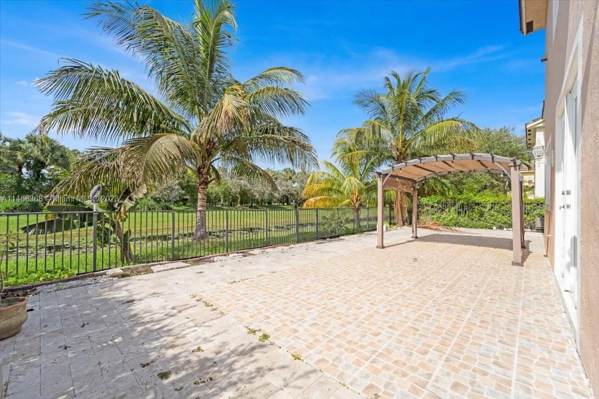 12441 Southwest 1st Street Plantation, FL 33325 - Photo 25 of 37 a view of road with a big yard