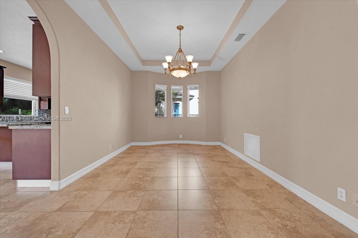12441 Southwest 1st Street Plantation, FL 33325 - Photo 10 of 37 a view of an empty room with a window