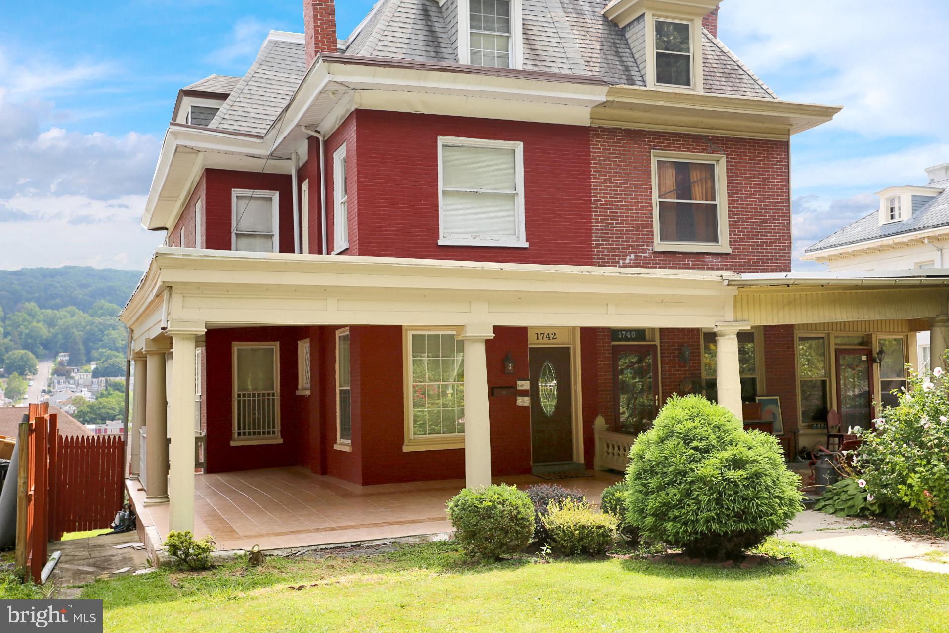 1742 Mineral Spring Road Reading, PA 19602 - Photo 2 of 31 front view of a house with a yard