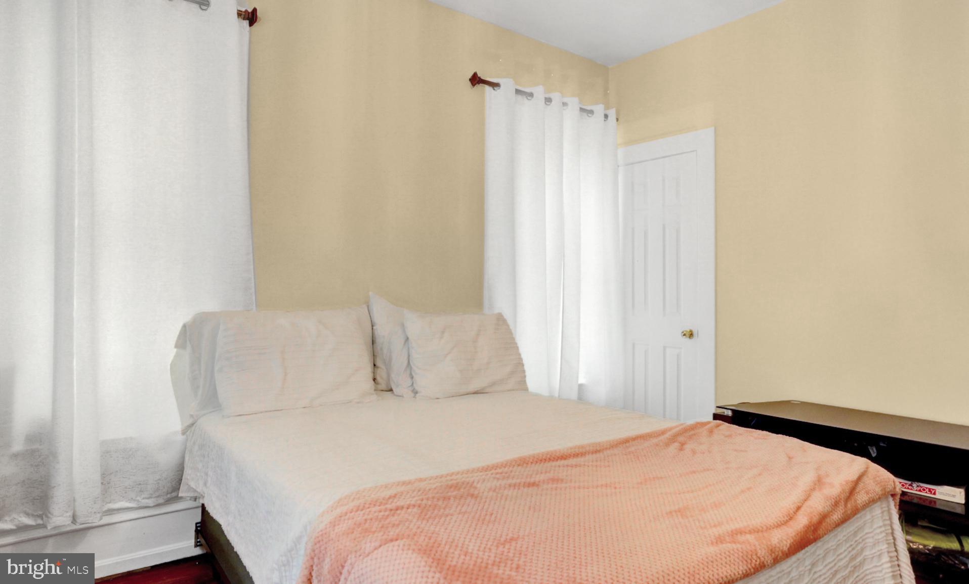 1742 Mineral Spring Road Reading, PA 19602 - Photo 23 of 31 a bedroom with a bed and a window