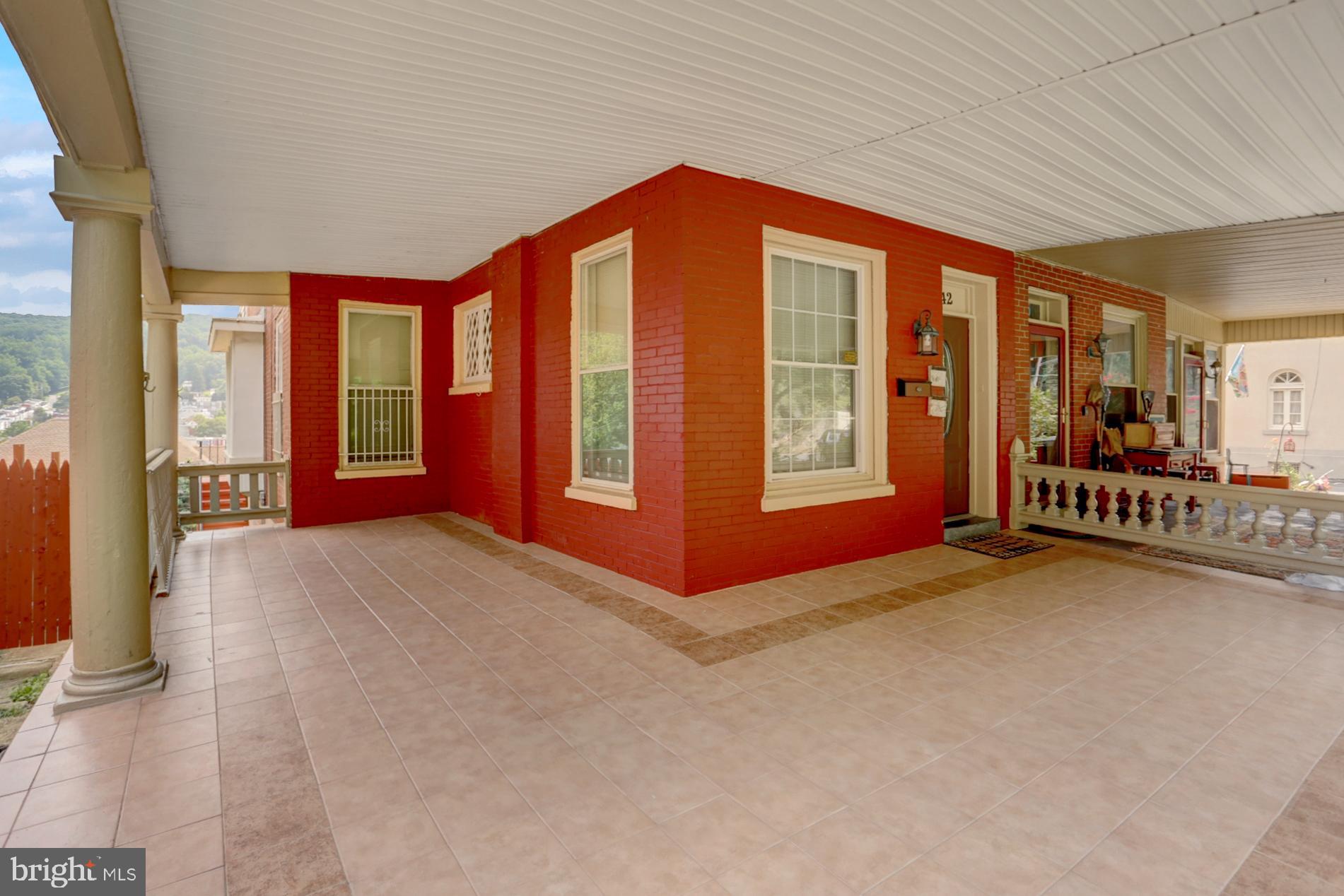1742 Mineral Spring Road Reading, PA 19602 - Photo 4 of 31 a view of an empty room with windows