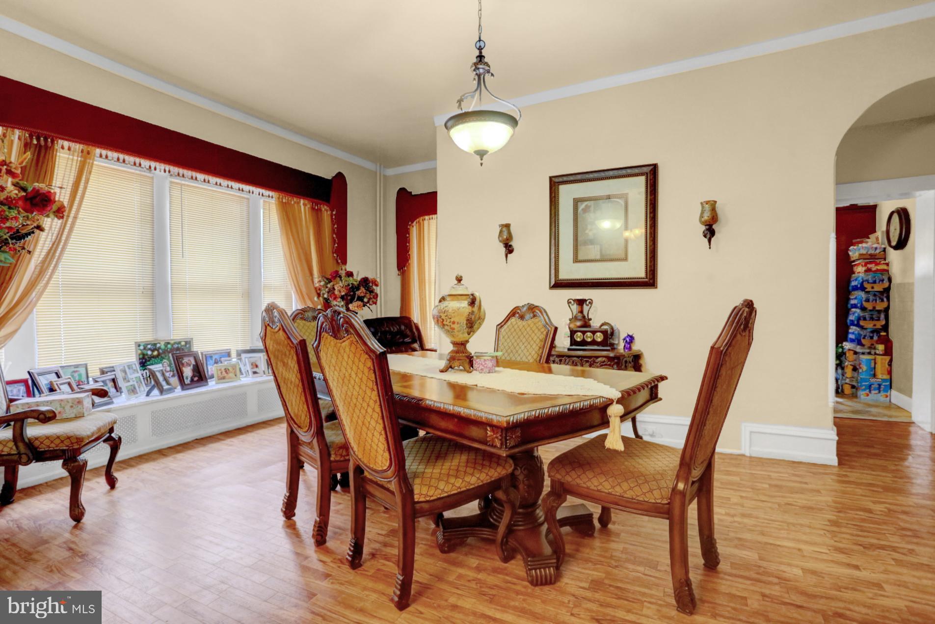 1742 Mineral Spring Road Reading, PA 19602 - Photo 9 of 31 a view of a dining room with furniture window and wooden floor