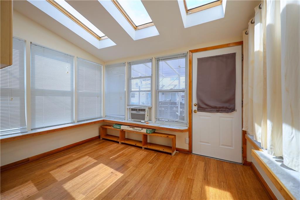 1940 20th Drive Brooklyn, NY 11214 - Photo 13 of 21 a view of an empty room and window