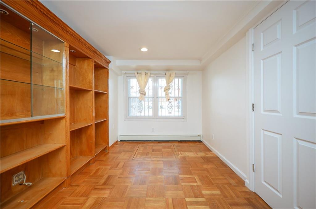 1940 20th Drive Brooklyn, NY 11214 - Photo 17 of 21 a view of an empty room with a window