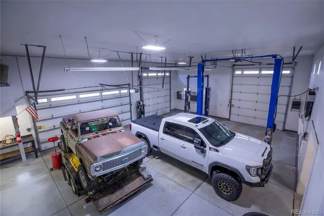 a car and car parked in a garage