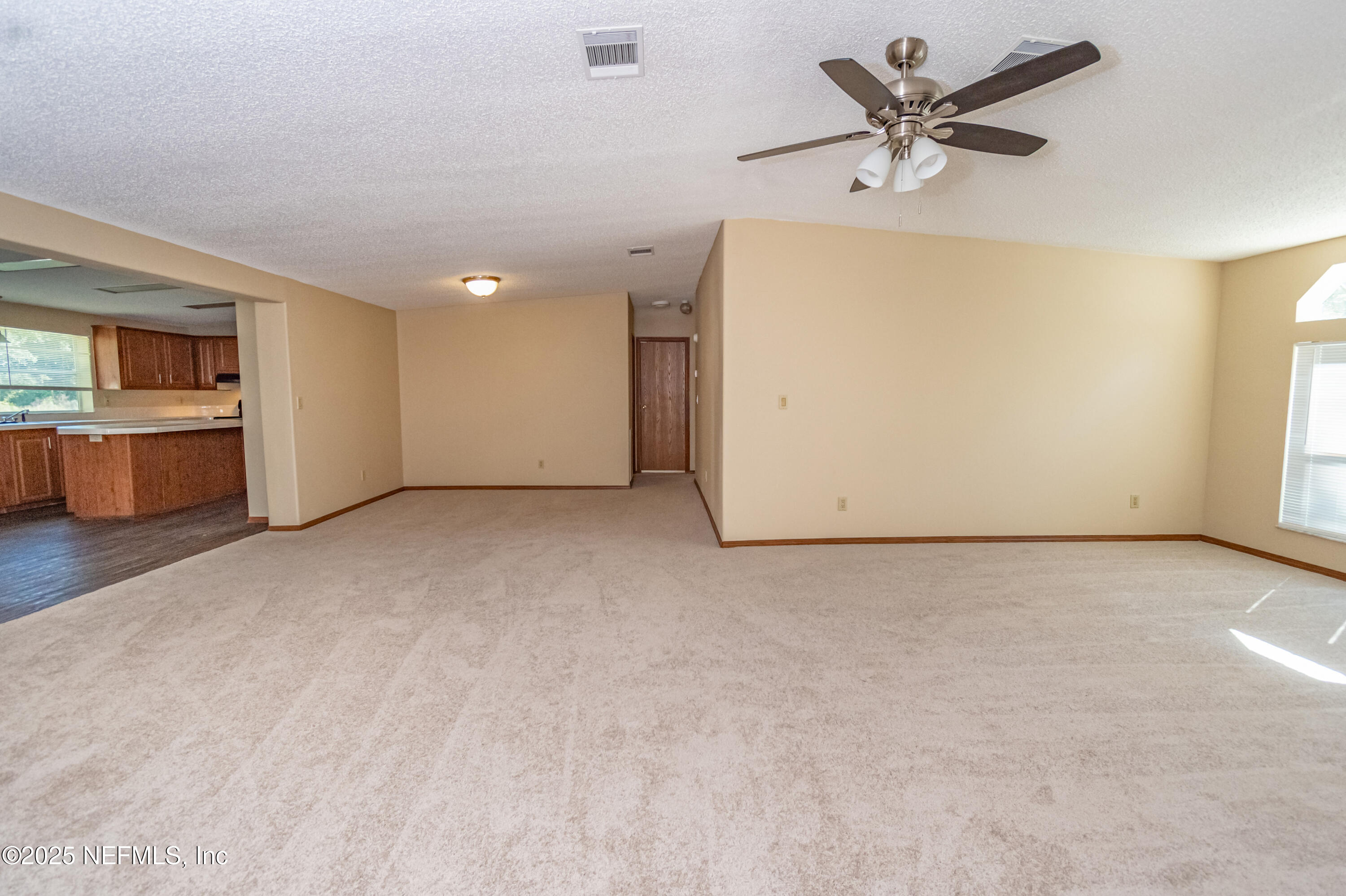 5577 Myrtle Road Macclenny, FL 32063 - Photo 19 of 58 a view of a livingroom with a fireplace