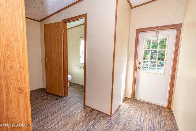 a view of a backyard with a cabin