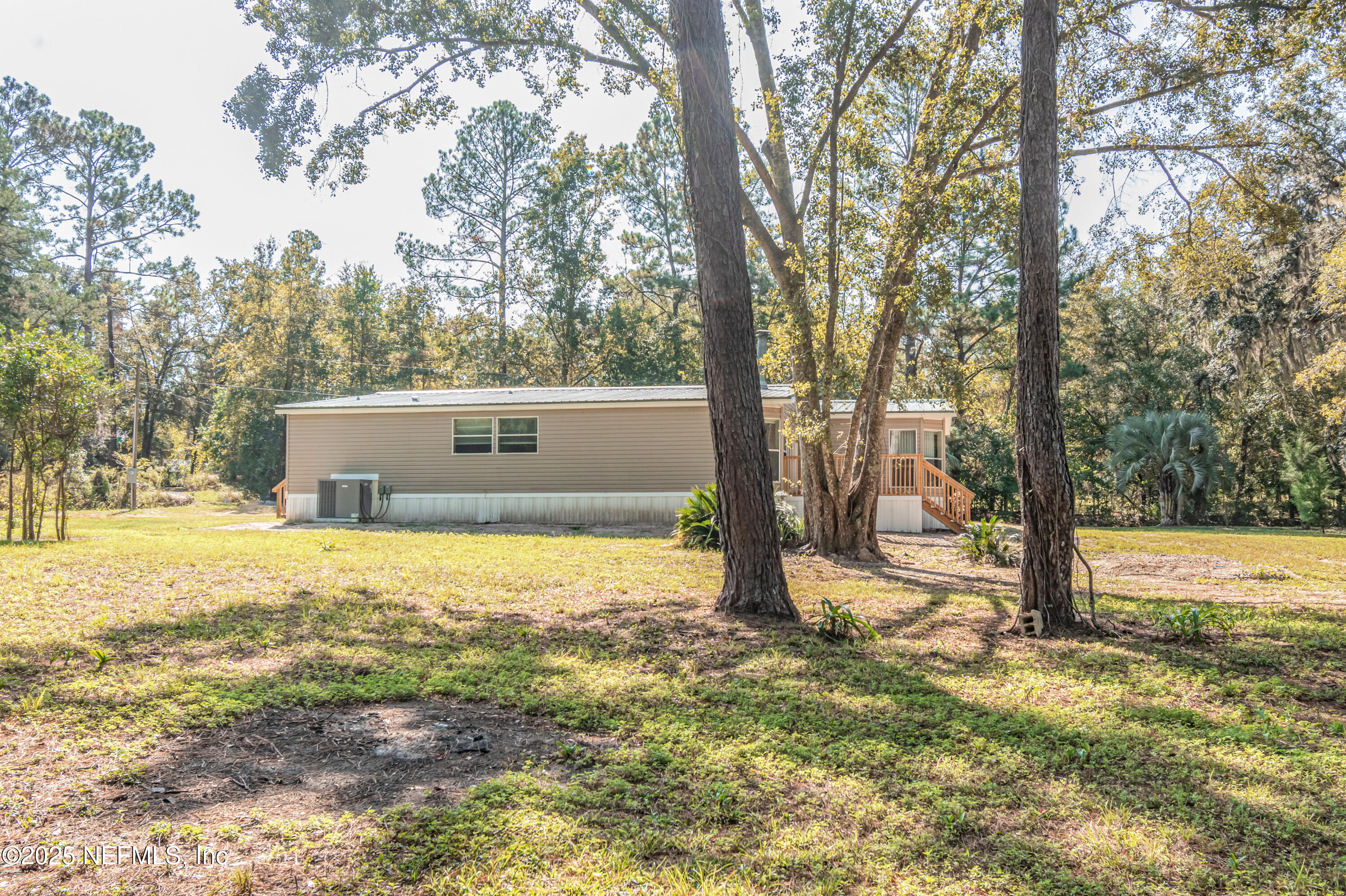 5577 Myrtle Road Macclenny, FL 32063 - Photo 43 of 58 a view of a house with a yard and tree s
