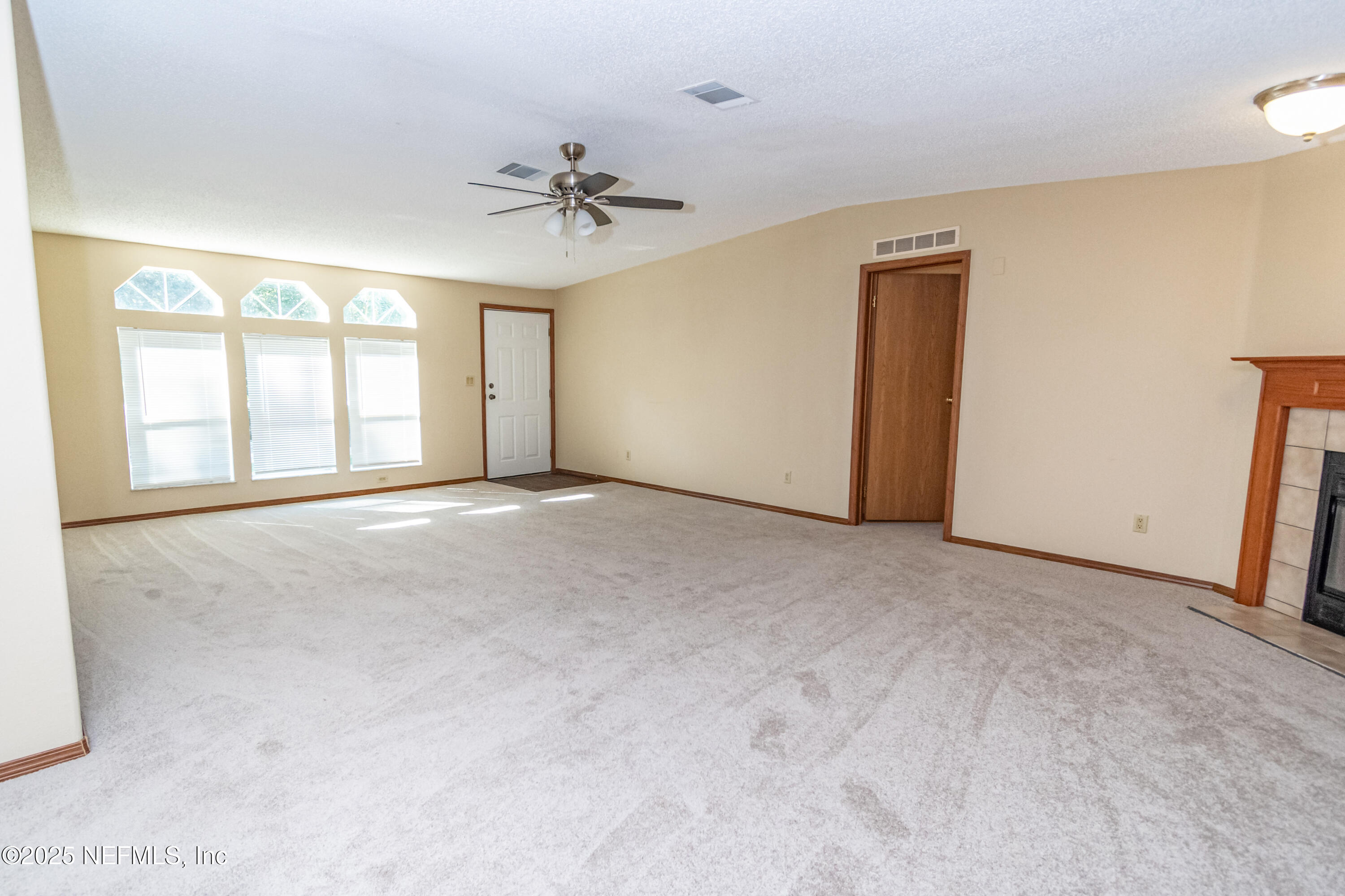 5577 Myrtle Road Macclenny, FL 32063 - Photo 7 of 58 a view of an empty room with a window